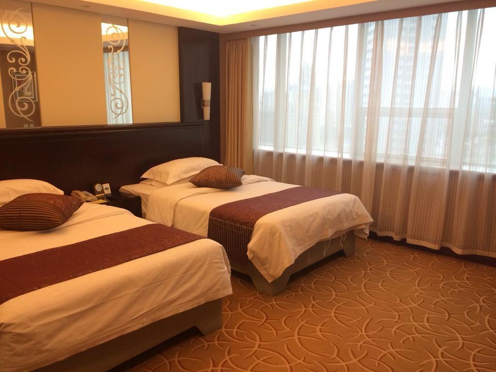 Green Land Hotel Kunming Habitación foto