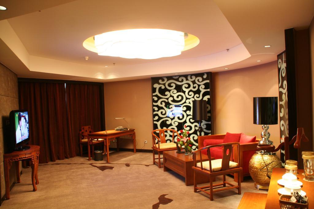 Green Land Hotel Kunming Habitación foto
